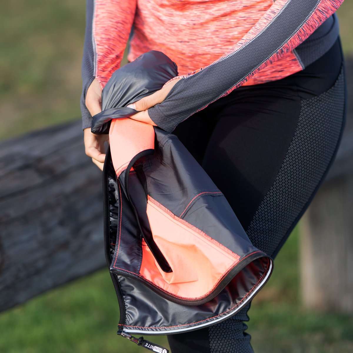 Venture Packable Women's Reflective Vest in Graphite / Coral Glo